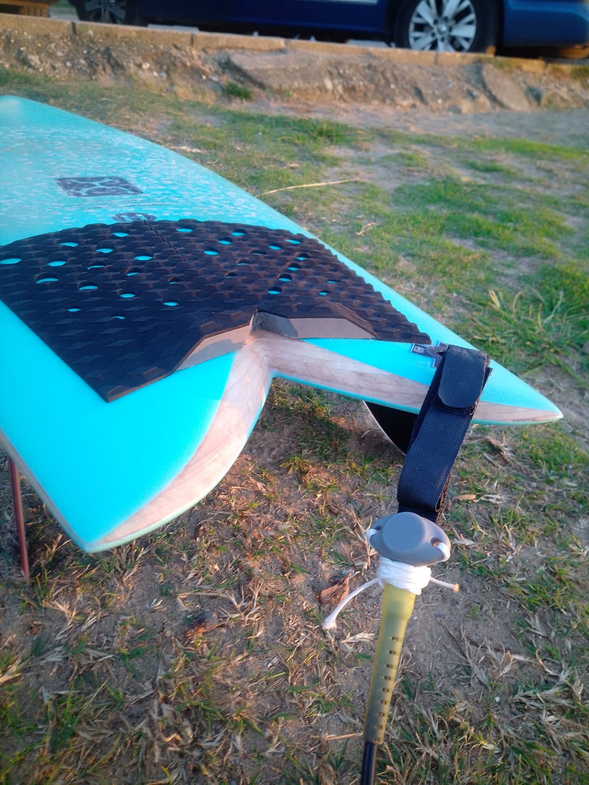 EnvLogger sensor attached to a surfboard leash